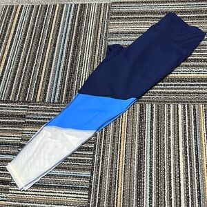 Fabletics PowerHold Leggings in Navy with Moisture-Wicking Fabric and High Waist